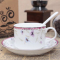 ceramic colored coffee cup and saucer